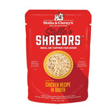 A 2.8 oz red pouch of Stella & Chewy's Stella's Shredrs Meal or Topper for Dogs, Chicken Recipe in Broth. Small image in center shows a bowl of shredded food.