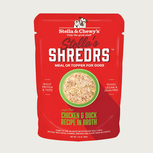 A 2.8 oz red pouch of Stella & Chewy's Stella's Shredrs Meal or Topper for Dogs, Chicken & Duck Recipe in Broth. Small image in center shows a bowl of shredded food.