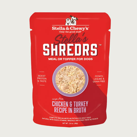 A 2.8 oz red pouch of Stella & Chewy's Stella's Shredrs Meal or Topper for Dogs, Chicken & Turkey Recipe in Broth. Small image in center shows a bowl of shredded food.