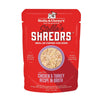 A 2.8 oz red pouch of Stella & Chewy's Stella's Shredrs Meal or Topper for Dogs, Chicken & Turkey Recipe in Broth. Small image in center shows a bowl of shredded food.