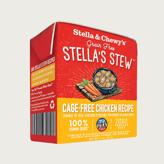 An 11 oz red & yellow carton of Stella & Chewy's Grain Free Stella's Stew, Cage-Free Chicken Recipe for Dogs. Single animal protein diet, chunks of real chicken & veggies smothered in bone broth. 100% human grade. Corners of box fold up, to open carton from perforated top edge.