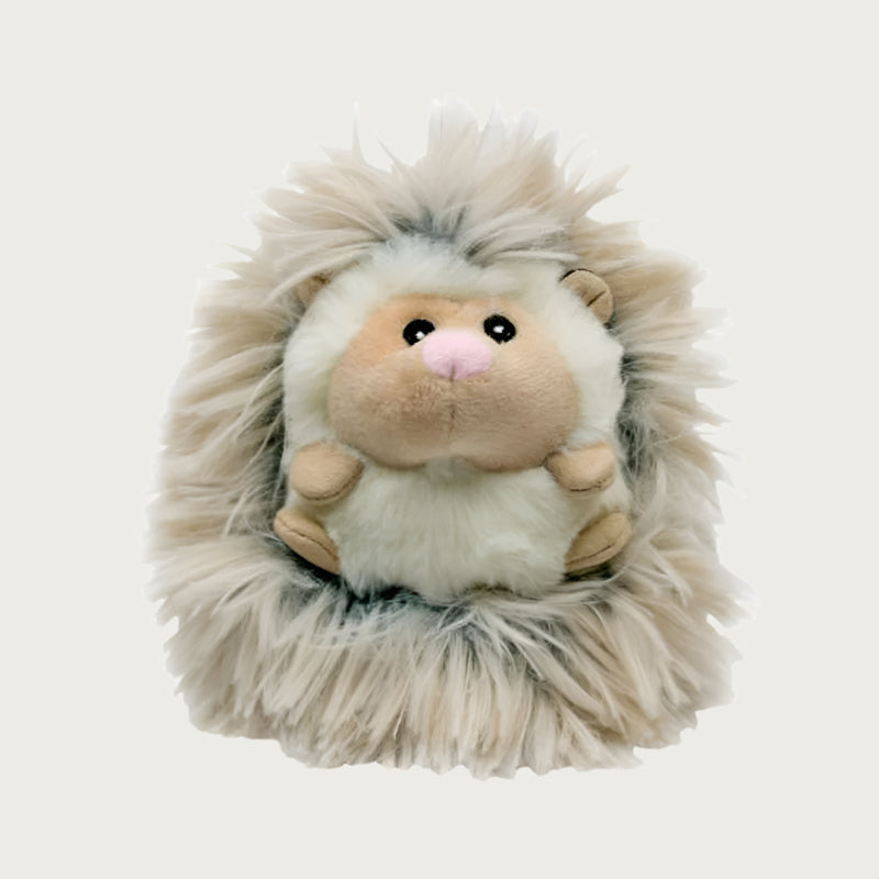 Front view of Fluffy Baby Hedgehog dog toy. It has a cream plush body with beige ears, feet and muzzle, with embroidered eyes and pink nose. Its back is covered in long, shaggy, cream & gray colored faux fur.