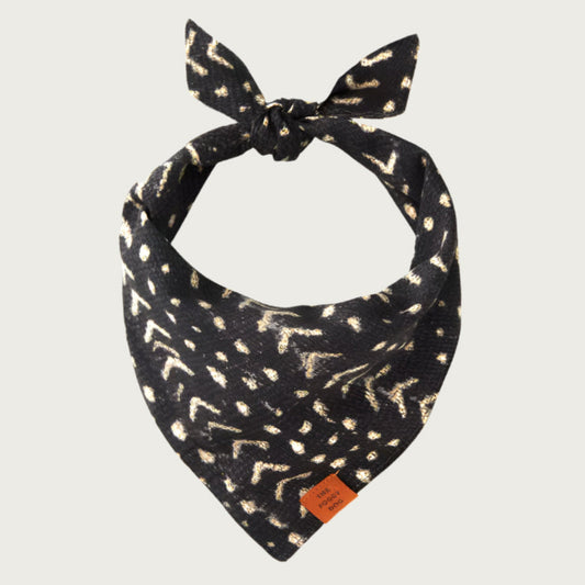 Black dog bandana with a rustic beige chevron and dot pattern.