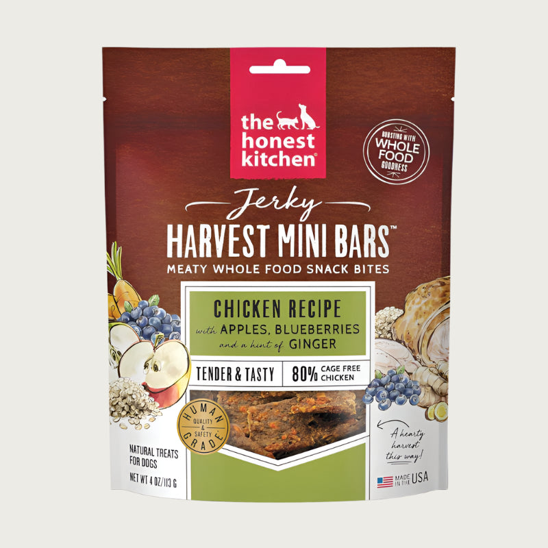 4 oz bag of Harvest Mini Bars from The Honest Kitchen, meaty whole food snack bites, chicken recipe jerky dog treats. 80% cage free chicken. Tender & tasty. Human grade. Small transparent window on front shows product inside: reddish brown squares.