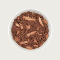 Load image into Gallery viewer, Close-up photo of a dish of Tiki Cat Ahi Tuna Recipe. Food is a reddish brown color, and is primarily a minced texture with flakes throughout.
