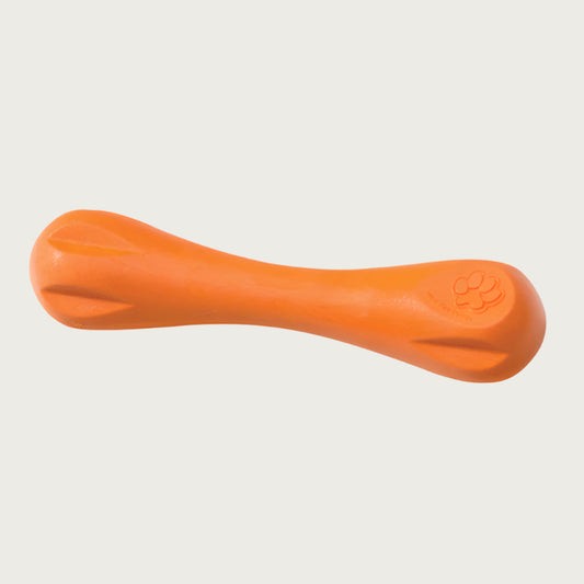 Tangerine (orange) colored Hurley toy, that looks like a rounded-off bone toy. Each end is larger with indentations for a dog to easily grab, the midsection is thick, but narrower than the ends. 