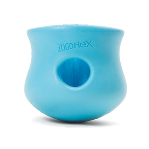 Aqua Blue colored Toppl toy. It has a cupped shape, with a slight indent on the top 1/3 of the toy, just under its lip. There is a round opening in the center, and the top of the toy is completely open. There are vertical ridges inside it.