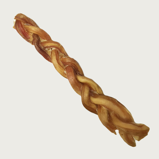 Single, thickly braided dog chew. Tan to light brown in color.
