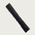 Load image into Gallery viewer, Close-up photo of a piece of a joy stick to show texture.
