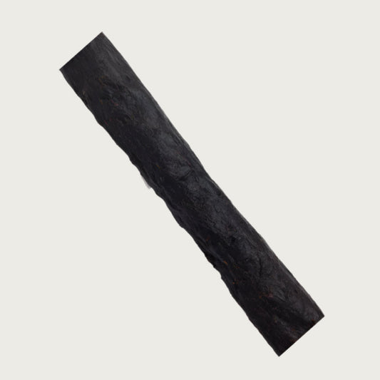 Close-up photo of a piece of a joy stick to show texture.