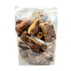 8 oz clear, cellophane bag of Wet Nose Buff Puffs exclusive dog treats. Product inside is visible; large and small square shaped, brown treats.