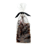 7 oz clear cellophane bag of Wet Nose exclusive Buffalo Jerky dog treats, tied with black ribbon. Product inside is brown, rectangular shaped strips.