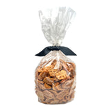 1 lb clear cellophane bag of Wet Nose exclusive Chicken Nuggets dog treats, tied with black ribbon. Coin-shaped treats inside are a pale orangey-tan color.