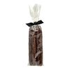 Clear cellophane bag of 5 count Wet Nose exclusive Duck Sticks dog treats, tied with black ribbon. 7"-8" sized reddish/brown sticks. 