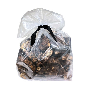 2 lb clear resealable bag of Wet Nose exclusive Moo Munch dog treats, tied with black ribbon. Product inside is visible; large and small square shaped, brown treats.