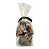 4 oz clear cellophane bag of Wet Nose exclusive Moo Munch dog treats, tied with black ribbon. Product inside is visible; large and small square shaped, brown treats.