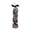 Clear cellophane bag of 15 count Wet Nose exclusive Sliders dog treats, tied with black ribbon. Product inside is round, brown discs.