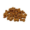 Close-up photo of a small pile of Wet Nose Teeny Meaties dog treats. They are tiny, brown, bone-shaped treats, about 1/2" wide and 1/4" thick.