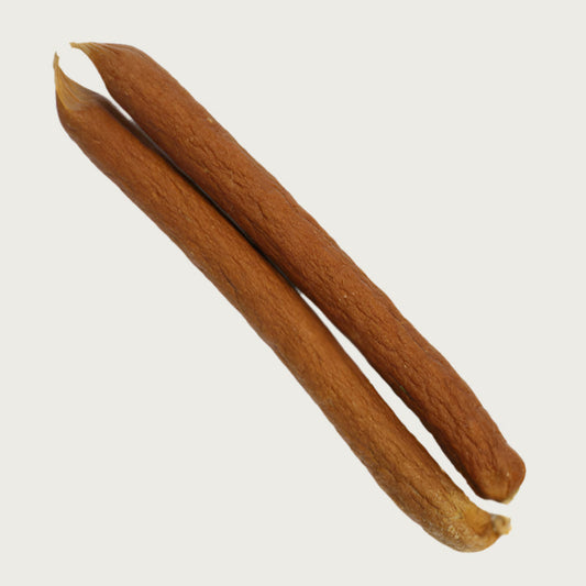 Two turkey link chews, side by side. They have tapered ends and are reddish-brown in color, with a slightly wrinkled exterior.