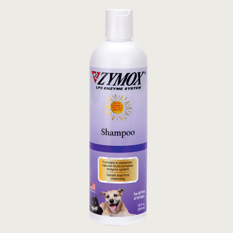 White plastic bottle with purple label of Zymox LP3 Enzyme System shampoo for all pets of all ages. Contains a complete, natural, multi-complex enzyme system. Gentle tear-free cleansing. Made in USA.