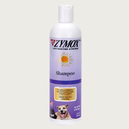 White plastic bottle with purple label of Zymox LP3 Enzyme System shampoo for all pets of all ages. Contains a complete, natural, multi-complex enzyme system. Gentle tear-free cleansing. Made in USA.
